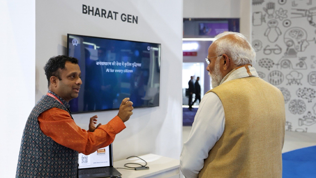 PM Modi BharatGen AI Impact Summit 2026 visit highlights India’s sovereign AI push as Prime Minister Narendra Modi tours BharatGen’s pavilion showcasing multilingual AI models for healthcare, agriculture and governance.